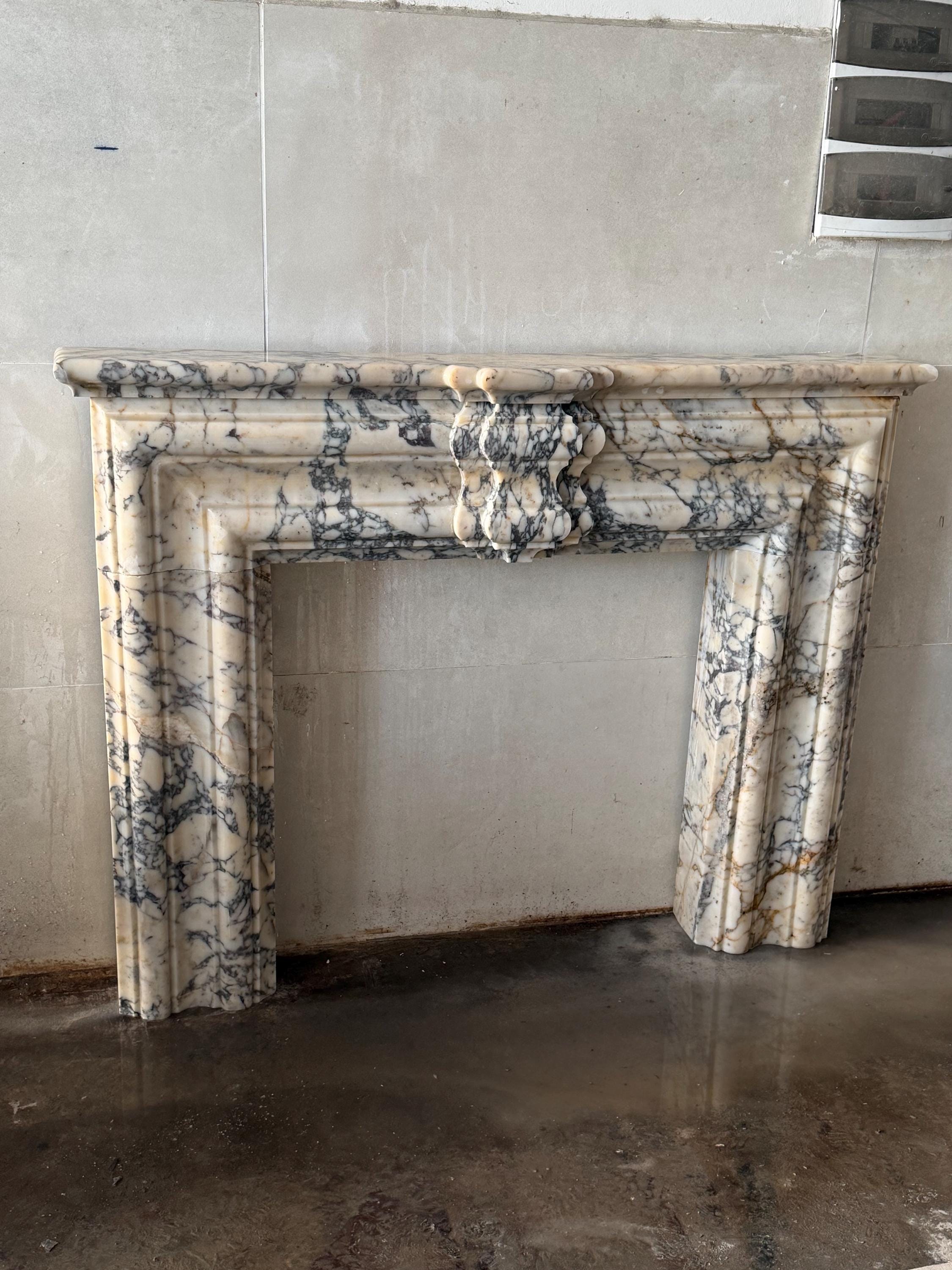 Hand Carved Calacatta Viola Marble Fireplace Mantel